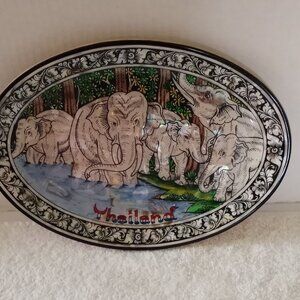 Small teakwood oval plate with Mother of Pearl elephant images , from Thailand